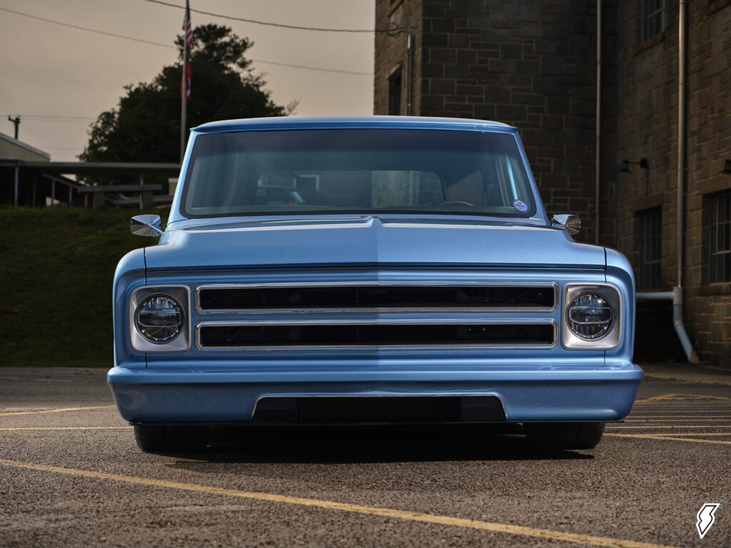 front grille shot of a custom blue chevy truck